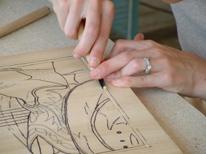 (Courtesy photo) Carolyn A. Hull crafts a relief print for her upcoming show.