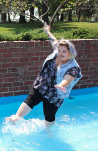 PHOTO BY BETHANY SHERROW / ASSISTANT NEWS EDITOR Heather Mynatt splashes through the fountain near Selmo Park, showing off her quirky personality.