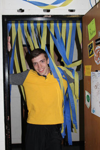  Andrew Canfield enters his room that his residents decorated for his return.  