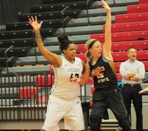 Senior forward Ashley Jones fights for position in the post against a Fort Hays defender. Jones finished with 10 points and four rebounds in 21 minutes. PHOTO BY ALEX AGUEROS