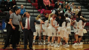 Head coach Dave Slifer talks with an official during a timeout in the first half of a 59-50 loss to Fort Hays State Dec. 17. PHOTO BY ALEX AGUEROS.