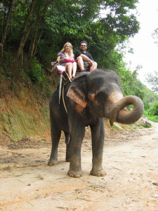 PHOTO SUBMITTED BY AKIS KALAITZIDIS Akis Kalaitzidis, right, and his cousin Evi Barla ride an elephant on Ko-Samui, an island in Thailand.