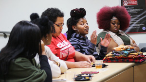 PHOTO BY KAITLIN BROTHERS / PHOTOGRAPHER Black students participate in a town hall meeting on Wednesday, Jan. 27, in Ward Edwards Building to discuss how the university can better recognize predominantly black student organizations on campus.