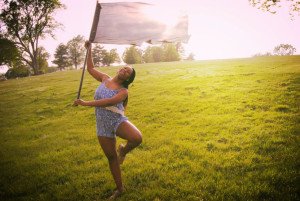 PHOTO SUBMITTED BY NYEMAH ETIENNE Nyemah Etienne spins in a field near Blue Springs lake.