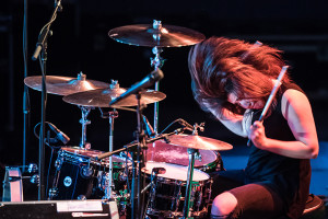 PHOTO BY MARIE NABORS / PHOTOGRAPHER The Summer Set drummer Jess Bowen rocks out on Thursday night, March 10, in the lower courts of the Student Recreation and Wellness Center.